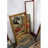 Two gilt framed mirrors and a mahogany mirror