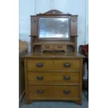 An Edward VII satin birch dressing chest