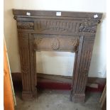 A cast iron bedroom fireplace