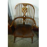 A reproduction elm Windsor armchair