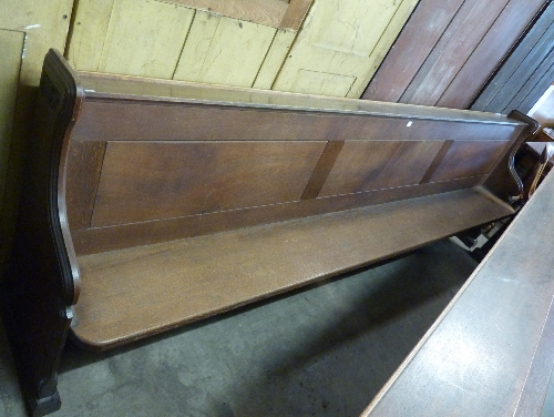 A large oak pew