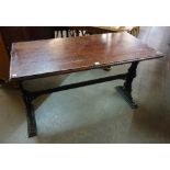 A mahogany and cast iron pub table