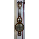 A George III mahogany banjo barometer