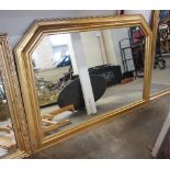 A gilt framed overmantel mirror