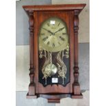 A mahogany Maxim 31 day clock