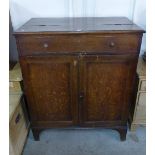 A George III oak two door cupboard