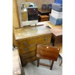 An oak dressing chest and folding table