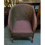 A Lloyd Loom armchair