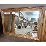 A gilt framed mirror