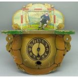 An automaton clock with goalkeeper and net,