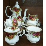 A Royal Albert Old Country Roses six setting coffee set and four cereal bowls,