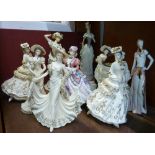 A collection of nine lady figures,