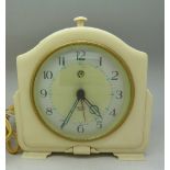A cream Bakelite Smiths Sectric clock with alarm