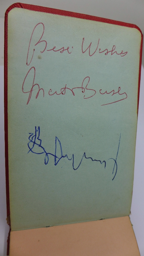 An autograph album with Manchester United related signatures including Bobby Charlton and Matt