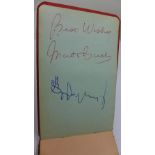 An autograph album with Manchester United related signatures including Bobby Charlton and Matt