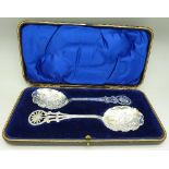 A pair of plated spoons,