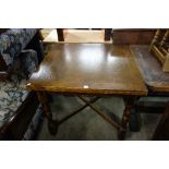 An oak draw leaf table