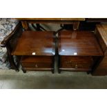 A pair of Stag mahogany bedside cabinets