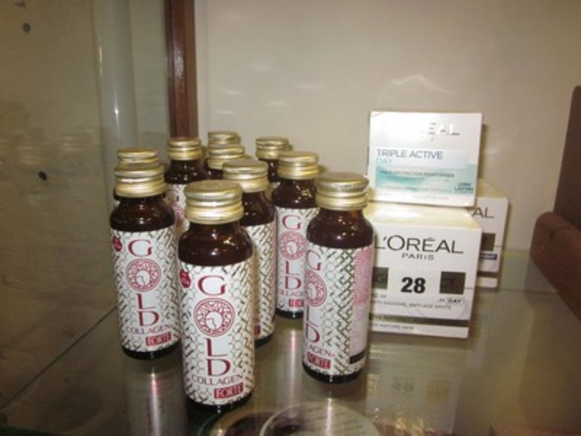 A quantity of skincare products to include ten bottles of Gold Collagen Forte, Age Perfect