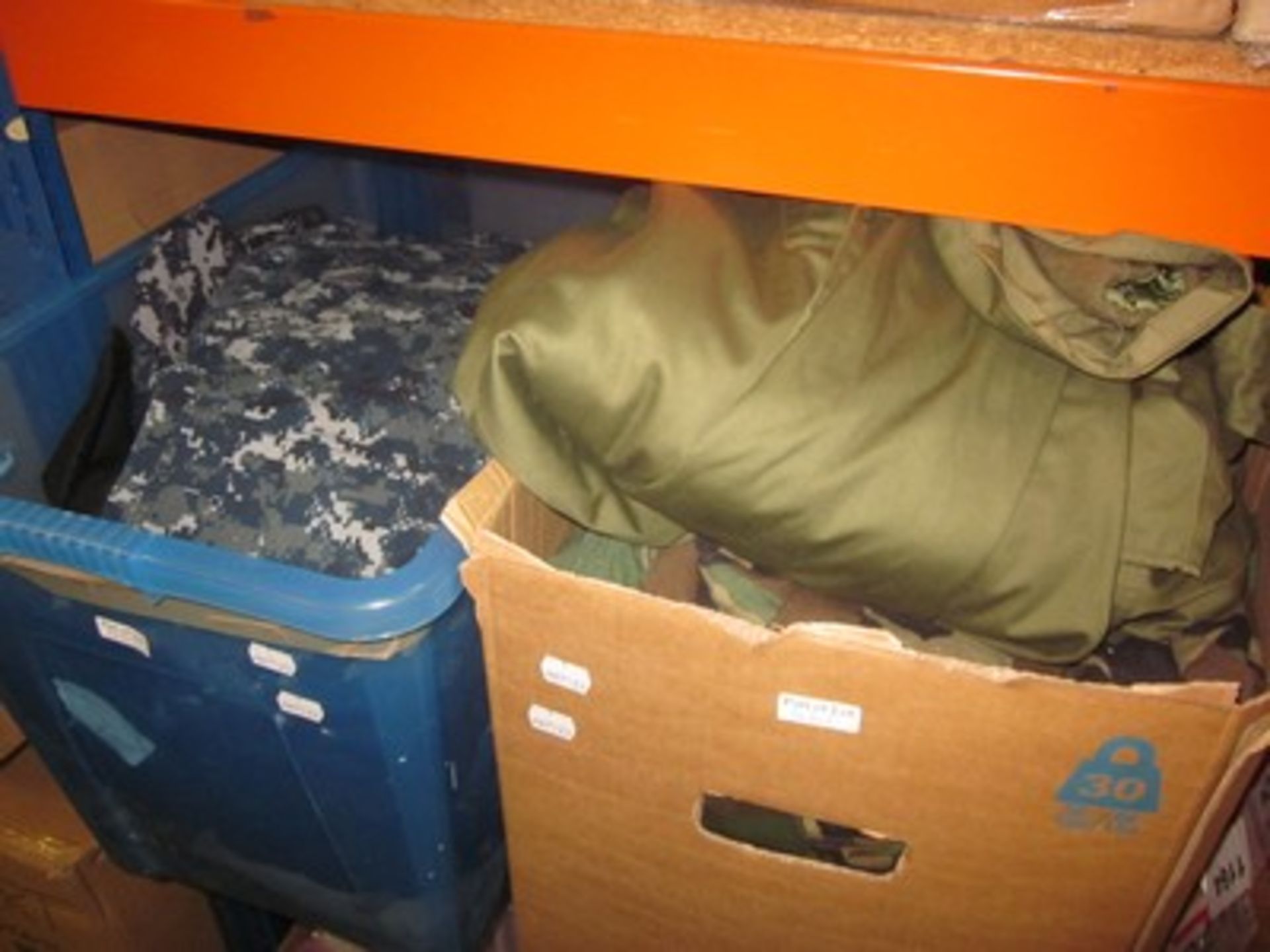 Nine boxes of US Army and Navy military surplus including combat jackets, trousers, caps and t- - Image 2 of 4