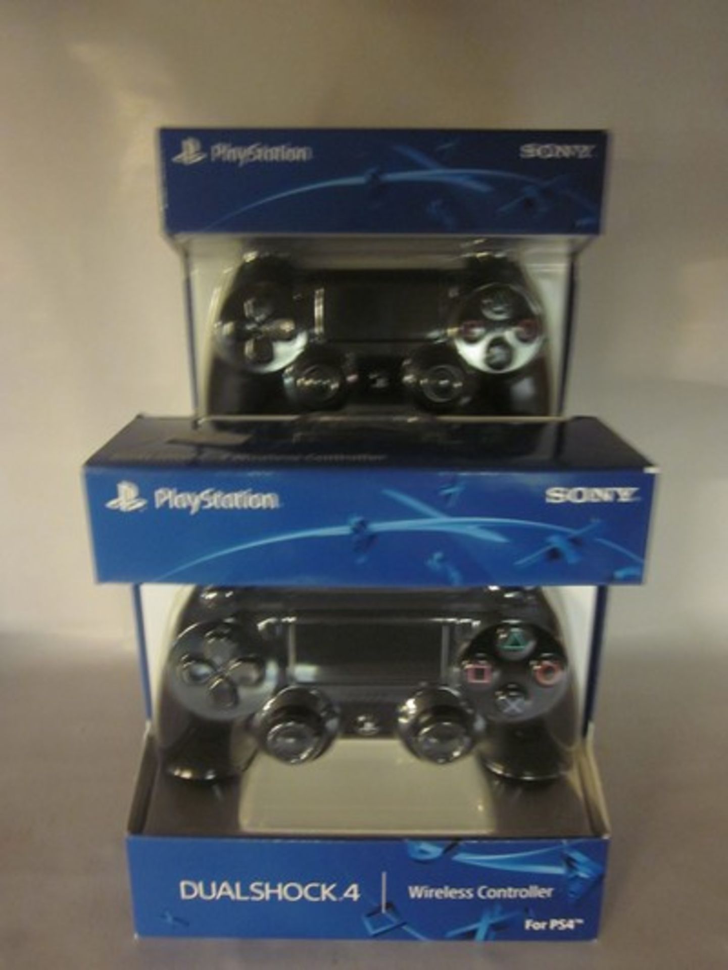 *Two black Sony Playstation 4 dualshock wireless controller's (Boxed as new). Buyers premium 20%.