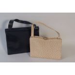 An Ostrich Skin Handbag. And a blue leat