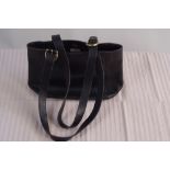 A Vintage Black Leather Coach Bag.  N0.