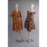 Two 1950's floral print dresses.  To inc