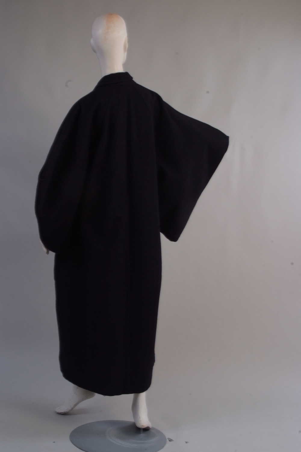 A 'Comme des Garcons' Wool Coat. Autumn/winter 1996 yellow on black ...