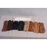 A collection of leather gloves (9) pairs