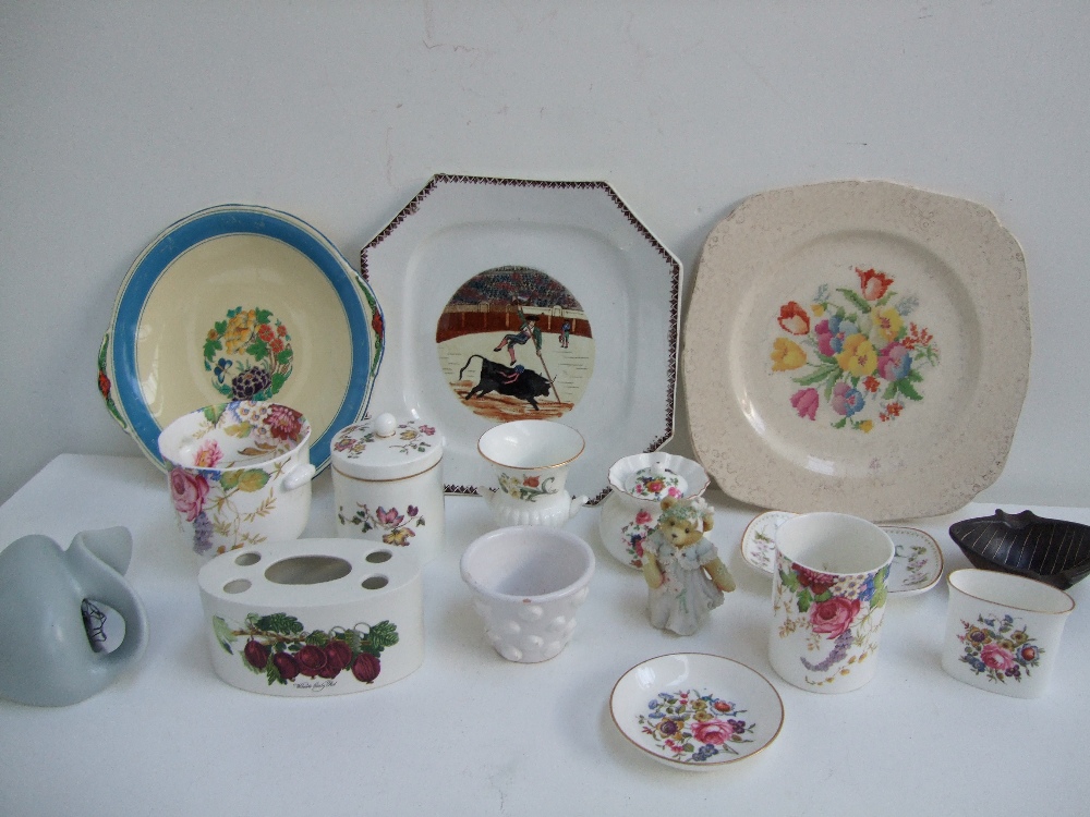 A quantity of china to include a Poole P
