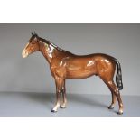 A Beswick figure of a bay horse 21cm hig