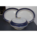 A Booths Pottery part dinner service to include graduating size meat platters, tureen dishes,