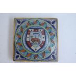 A majolica tile hand painted with herald