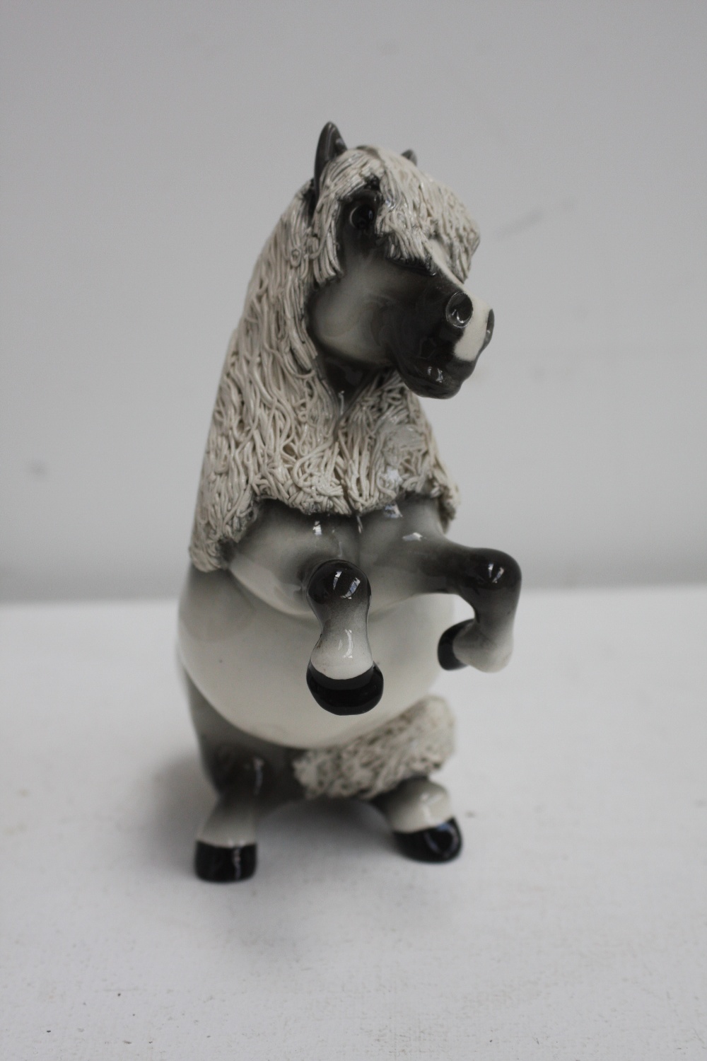 A Cheval Ceramics comical horse figurine