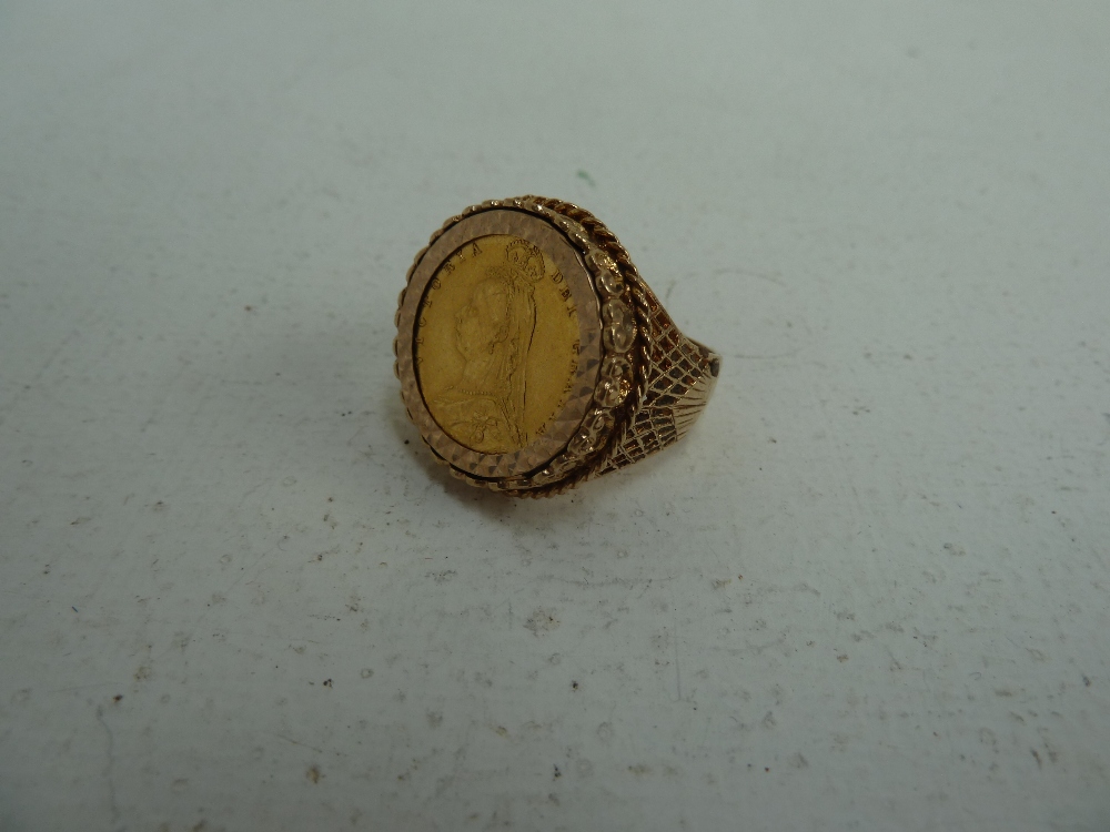 A Victorian sovereign mounted into a 9ct