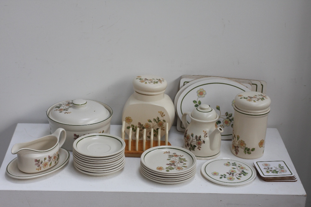 A large quantity of Marks and Spencer 'Autumn Leaves' pattern tea service including three teapots,