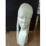 An early 20th century carved ivory tusk in the form of an African lady, 18cmH, (660g)