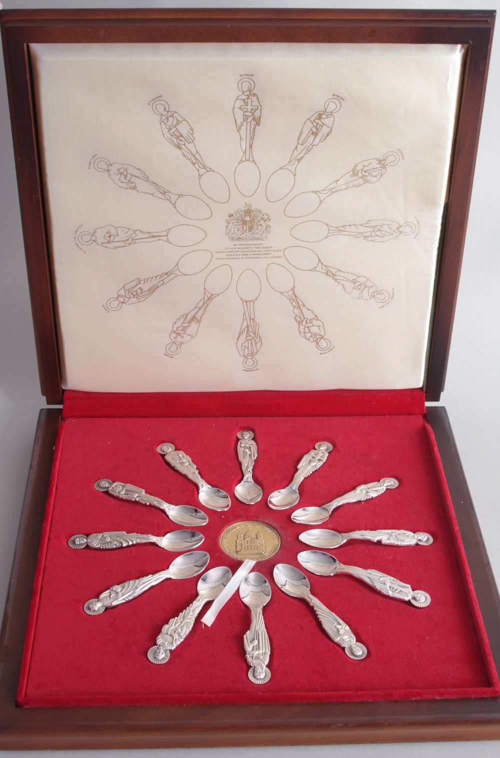 A set of twelve silver hallmarked Elizabeth II apostle spoons and a medallion (.