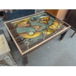 A 20th century table with 17th century map design to top,