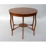 An Edwardian Arts & Crafts walnut and marquetry centre table,