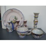 A collection of French Pottery to include Quimper to include a candlestick,