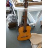 A Kent Palencia 60E six string acoustic guitar with strap and bag