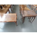 A nest of three side table, glass tops, raised on carved cabriole legs,