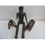 A West African carved figure, a carved man with articulated limbs,