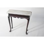 A George II period and later walnut side table, with variegated white marble top,