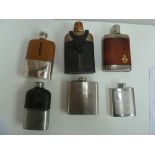 A selection of six hip flasks,