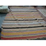 An OKA wool and jute mix rug, of striped design,