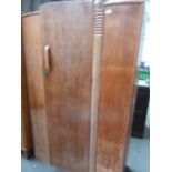 A 30's pine wardrobe, carved with roses,