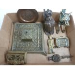 A tray of various brass items,